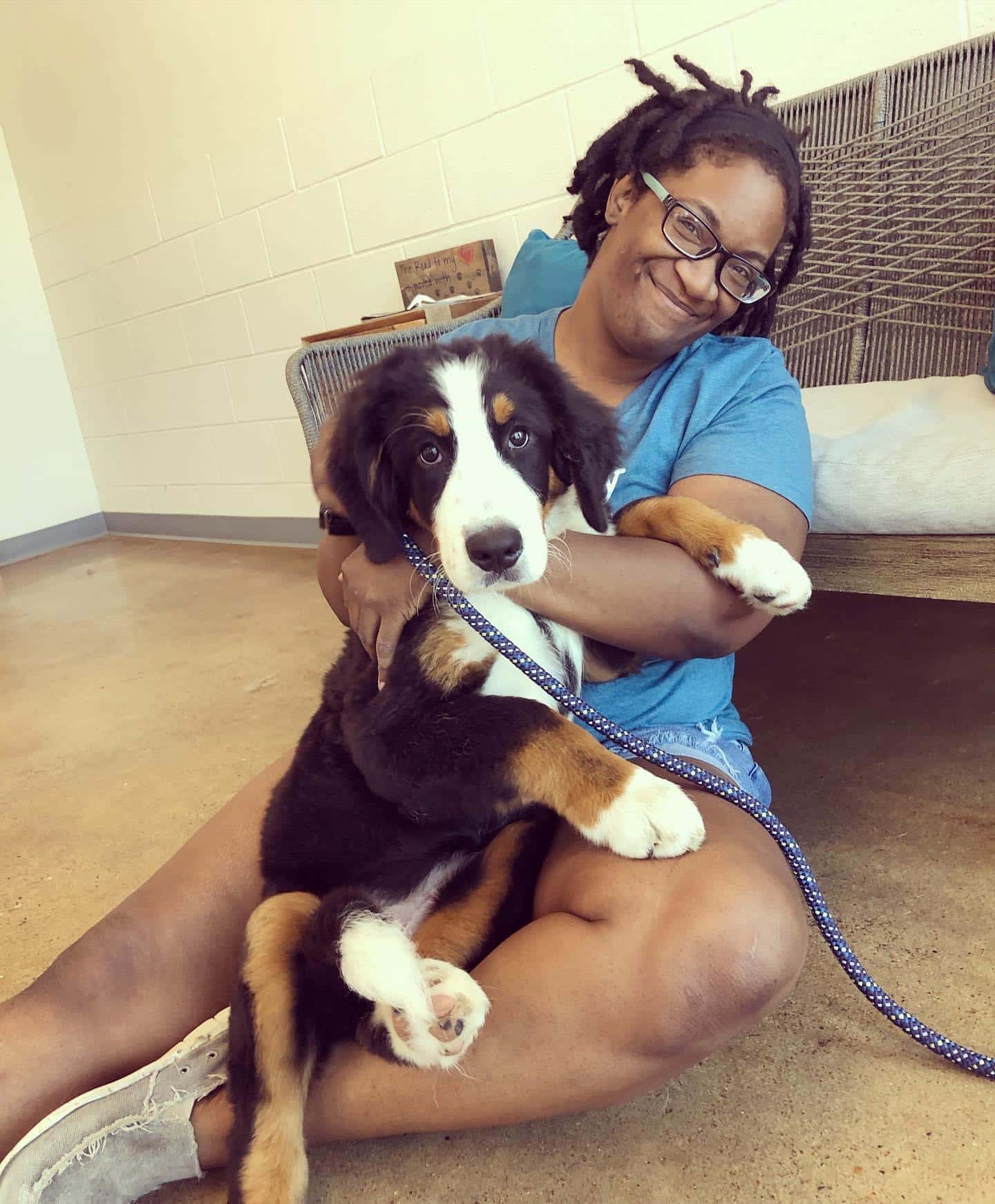 dog with Hounds Lounge employee